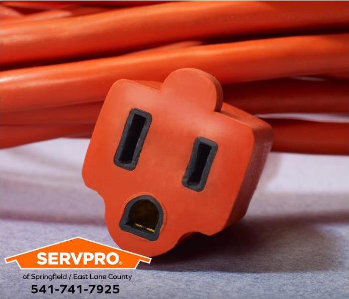 An orange extension cord is shown.